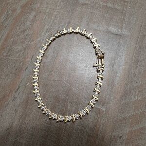 14k yellow gold and diamond tennis bracelet 7 inches